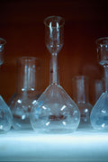 Ipamorelin research peptide glassware in laboratory