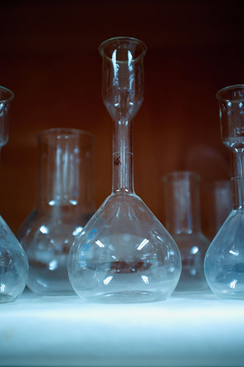 Ipamorelin research peptide glassware in laboratory